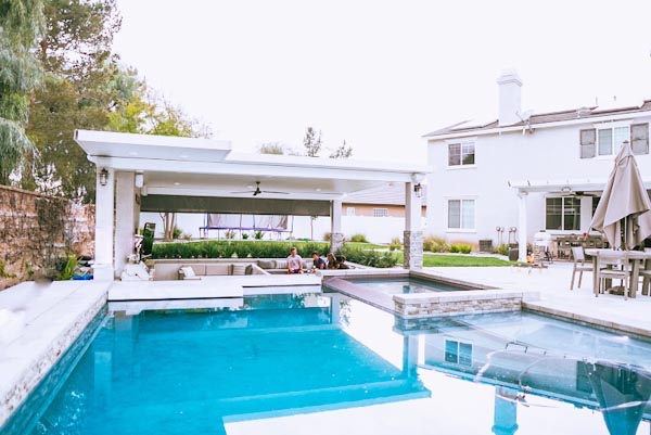 resort style living pool and backyard oasis