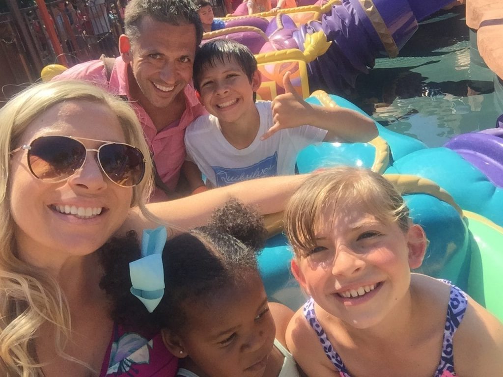 Family on Magic Carpet ride in Magic Kingdom | Global Munchkins
