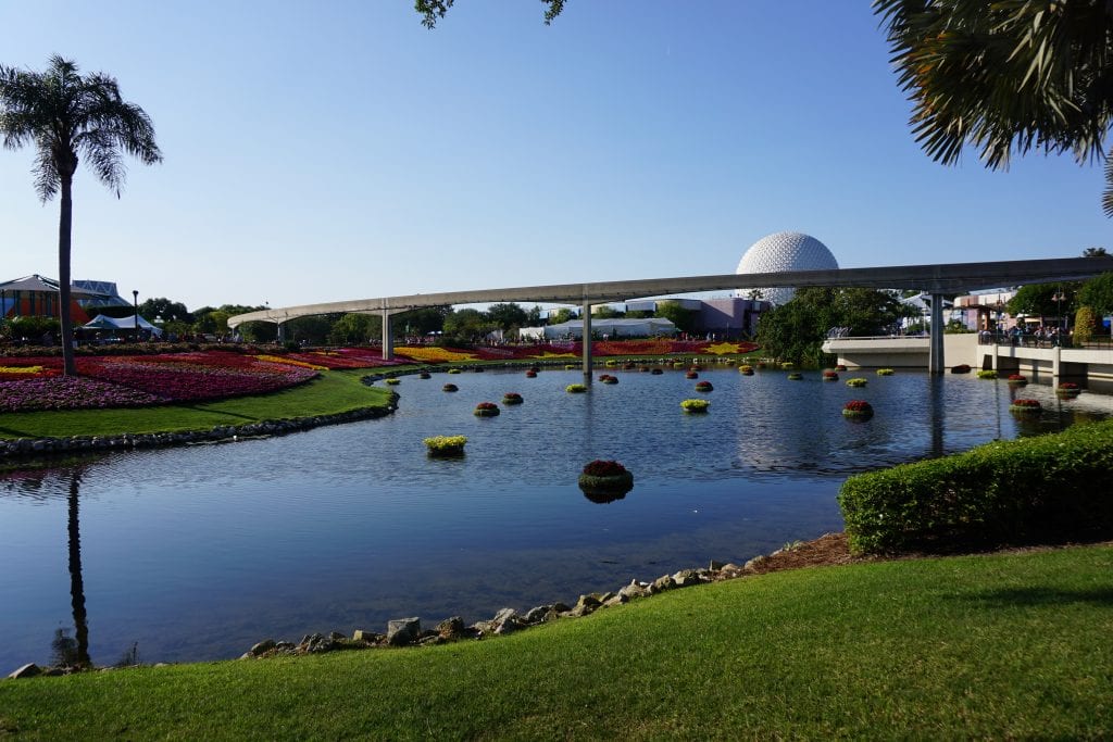 Gorgeous image overlooking the lake at Epcot with Ball in Background | Global Munchkins