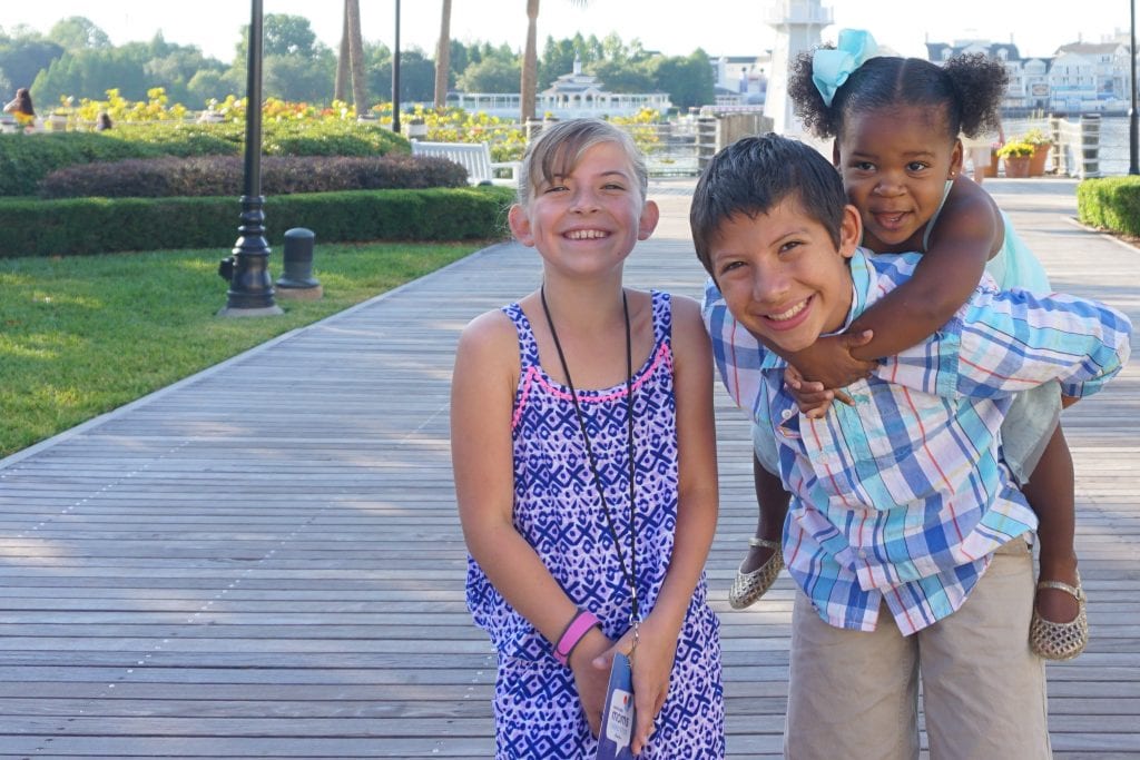 Happy Transracial Adoptive Family on boardwalk at Beach Club Resort | Global Munchkins