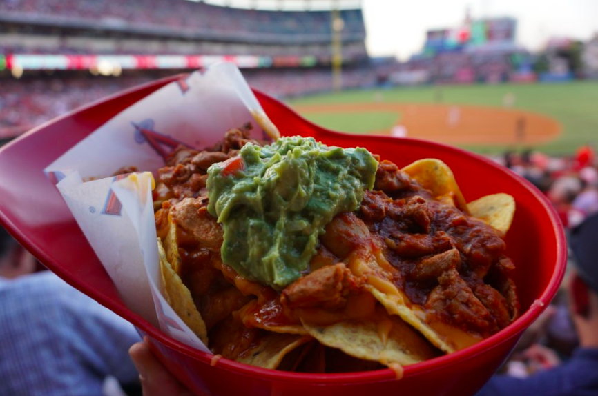 Delicious helmet nachos while watching a baseball game at the Anaheim Angels Stadium | Global Munchkins